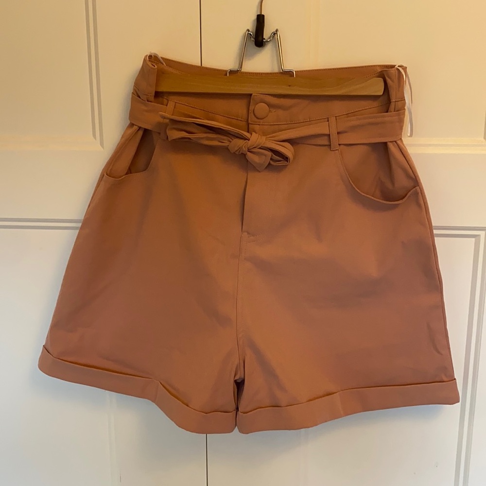 High-waisted pink dress shorts